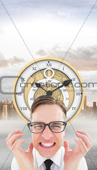 Composite image of geeky young hipster feeling frustrated