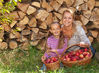 Happy apple harvesters