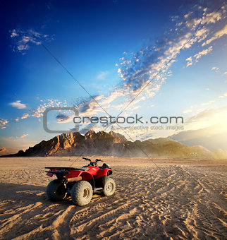 Quad bike in desert