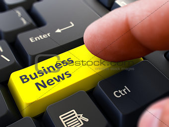Business News - Written on Yellow Keyboard Key.