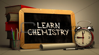 Learn Chemistry Handwritten on Chalkboard.
