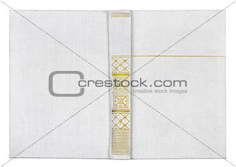 Vintage textile white cover book with golden ornament
