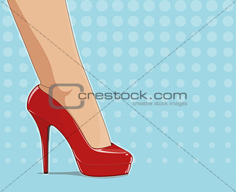 Red fashionable shoes on female foot