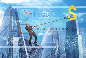 Man climbing skyscraper with world map