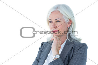 Thoughtful businesswoman touching her chin