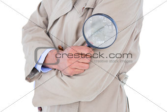 Spy looking through magnifier