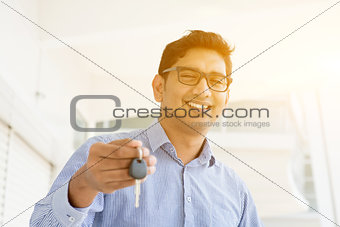 Man hand holding new key