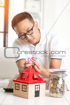 asian male worried about property taxes