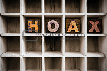 Hoax Concept Wooden Letterpress Type in Draw