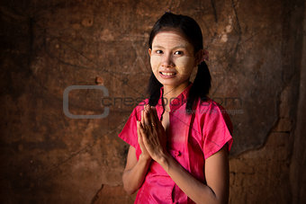 Young Myanmar girl blessing