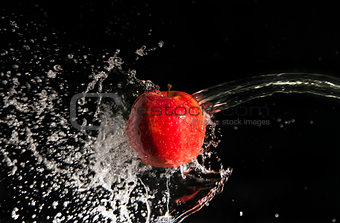 Water splash and apple
