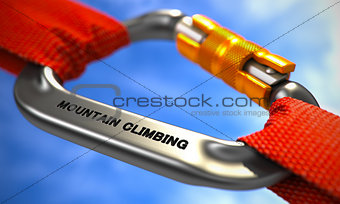 Mountain Climbing on Chrome Carabiner between Red Ropes.