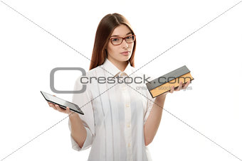 Young woman with book and tablet