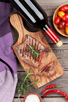 Grilled steak with spices and wine