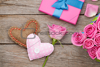 Valentines day card with gift box full of pink roses and handmad
