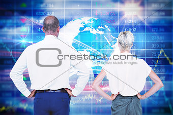 Composite image of  smiling business people with hands on the hips