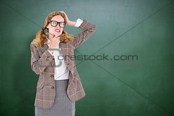 Composite image of geeky hipster thinking with hands on chin and temple