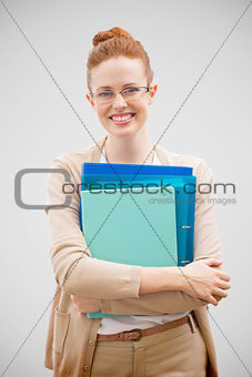 Composite image of teacher with files