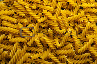 Fusilli pasta background. Italian cuisine.