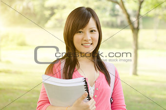 Young Asian university girl student