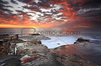 Summer sunrise over Maroubra and reflections