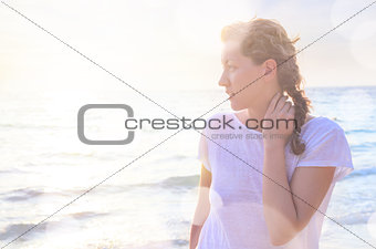 Portrait of young woman at the beach