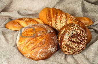 Various grades of bread in the middle of a sacking