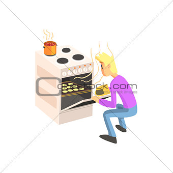 Guy Taking Out Cookies From Oven