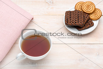 Cup of tea and various cookies