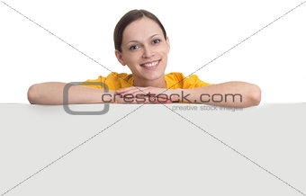 smiling woman hold white blank paper board