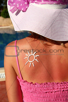 from sun cream on the female back 