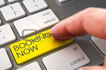 Hand Touching Booking Now Button.