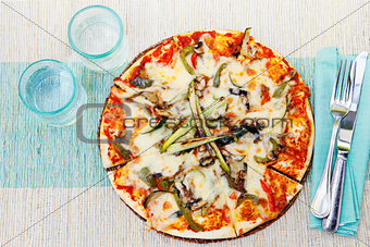 Healthy vegetables and mushrooms vegetarian pizza