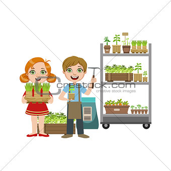 Girls And Boy With Gardening Inventory