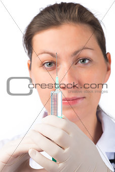 face doctor and syringe close up on a white background