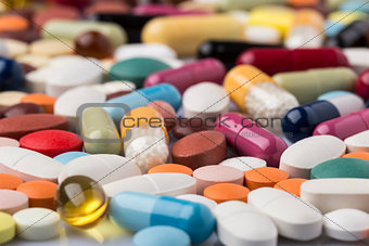 Pharmaceutical background of colorful pills and drugs