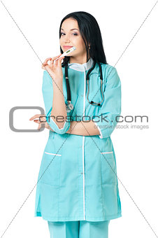 Female doctor holding thermometer