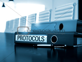 Protocols on Ring Binder. Blurred Image.