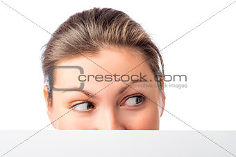 female eyes look in the direction of a white background