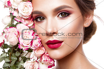 Portrait of young beautiful woman with stylish make-up