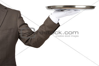 Arm in white glove with empty flat plate