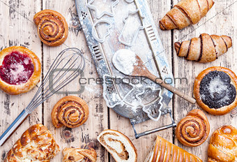 Delicious holiday baking background with ingredients and utensils