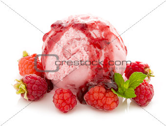 Ice cream and fresh red raspberries.
