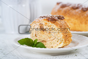 Biscuit roll with condensed milk, selective focus