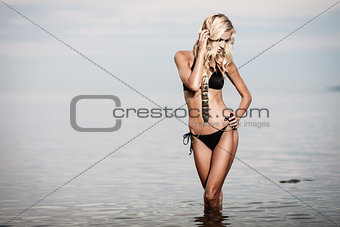 Woman in black bikini