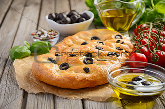 Italian Focaccia bread with olives and rosemary