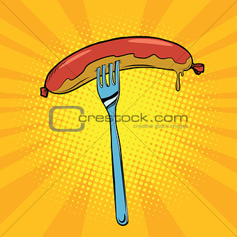 Grilled sausage on a fork