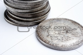 Stack of dollars and coins