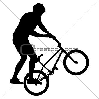 Set silhouette of a cyclist male performing acrobatic pirouettes. vector illustration