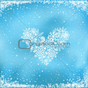 snow heart on blue background